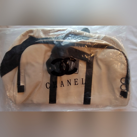 CHANEL Handbags - CHANEL Beige Cream Black Logo Duffle Bag GWP Gift With Purchase Authentic